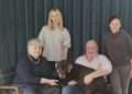 Lena (standing, left) and Oksana (standing, right) and their hosts Lynda Tyler-Cagni (sitting, left) and Gian Piero Cagni (sitting, right).