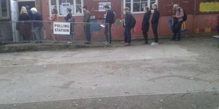 People queuing to vote in Peckham