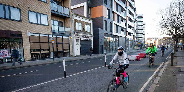 Cyclists use the trial Cycleway 4  in Greenwich on the A206.