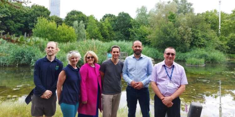 Kieron Wiliams (second from right) and Catherine Rose (third from left) visited Lavender Pond, Rotherhithe.