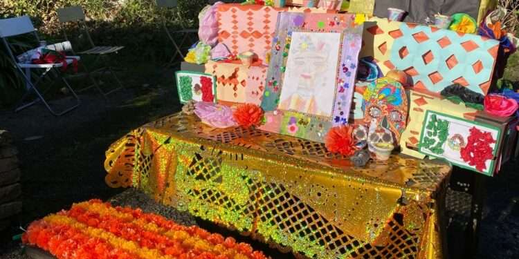 Local kids from two schools made their own "offerings" to celebrate the Mexican Day of the Dead.