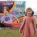 GOSH patient Sienna with completed TCS London Marathon mural featuring her portrait.