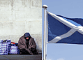 (1) Homeless Person Credit: Gary Knight (2) Scottish flag