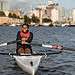 A girl rowing at Canada Water Dock