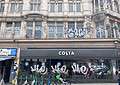 Graffiti covering the window panes of Peckham's Costa Coffee. Photo by Robert Firth