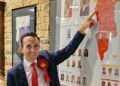 Youcef Hassaine celebrates Labour's win