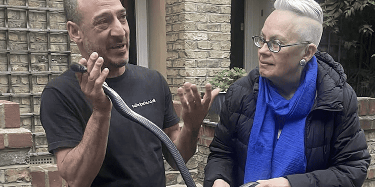 Local conservationist Peter Prodromou (left) and Cllr Maria Linforth-Hall with the snake