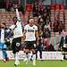 Romain Esse lead the celebrations after hitting the winner. Image: Millwall FC