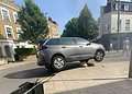 A car got stuck on a bollard in Herne Hill