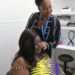 A woman with alopecia getting her wig fitted at Guy's and St Thomas' hospital.