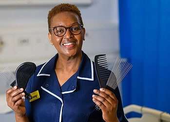 Ginny Wanjiro, a nurse at St Thomas' hospital is up for The Sun's Who Cares Wins Awards.