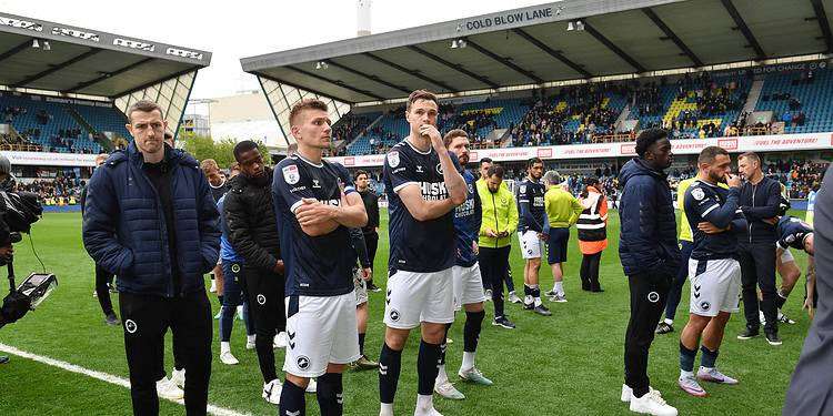 Millwall's disappointed squad gather at full-time. Image: Millwall FC