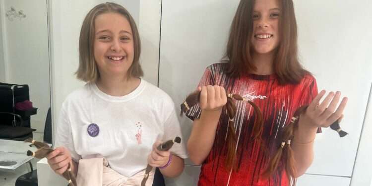 Leyla-Mae Kemal, 12 and Nikki Young, 11, sport their new bobs.