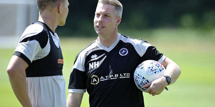 Neil Harris with his club captain. Photo: Millwall FC