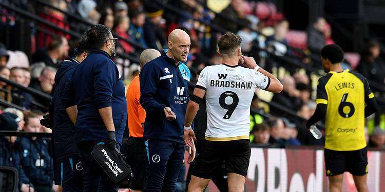 Adam Barrett gives Tom Bradshaw instructions. Photo: Millwall FC