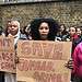 Parents gathered with placards outside Comber Grove Primary School