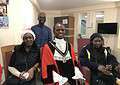 Left to right: Tenant Jenny Powell, Southwark Mayor Michael Situ and local resident Maggie Chibangu. Back: Manager Abdul Saluh