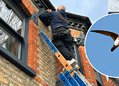 Local roofer Darren Long installing a box on an East Dulwich home: Swift image credit: animal.boi