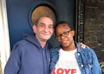 Hero neighbour Nick Fenlon with brave mum Nickola Chatham outside her burned flat