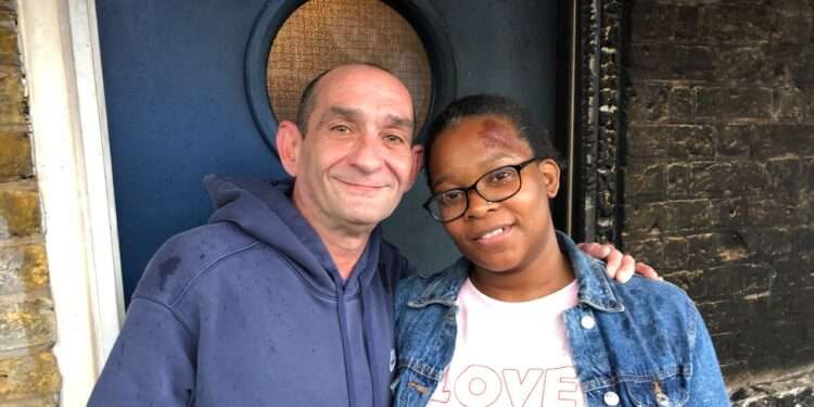 Hero neighbour Nick Fenlon with brave mum Nickola Chatham outside her burned flat