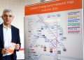 The Mayor of London, Sadiq Khan with the new London Overground map